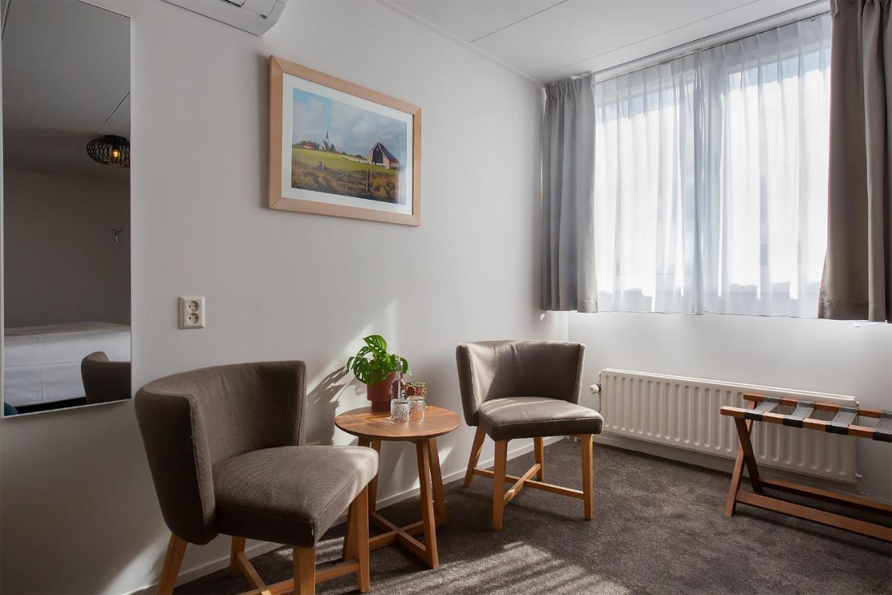 Boutique Hotel Texel De Cocksdorp  Eksteriør bilde A room at the hotel