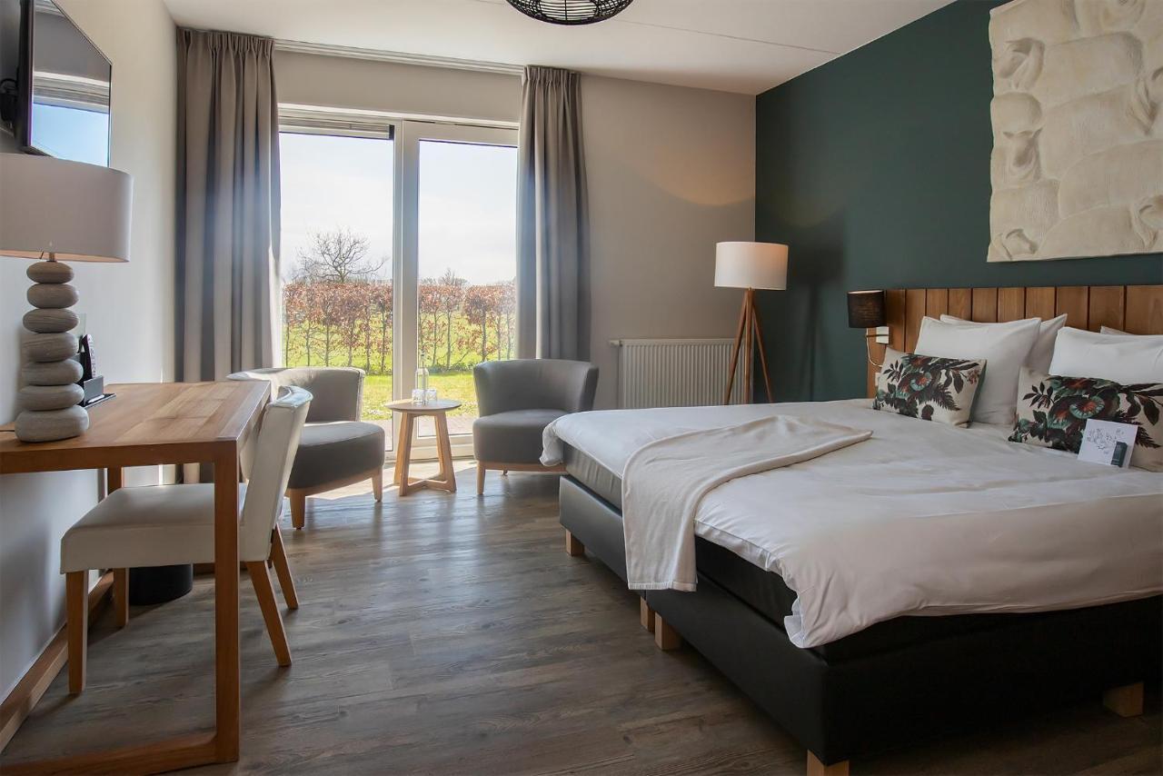 Boutique Hotel Texel De Cocksdorp  Eksteriør bilde A room at the hotel