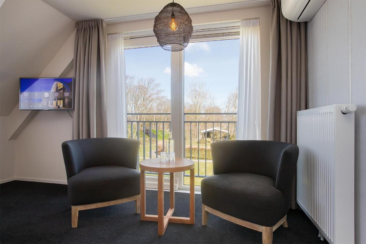Boutique Hotel Texel De Cocksdorp  Eksteriør bilde A room at the hotel
