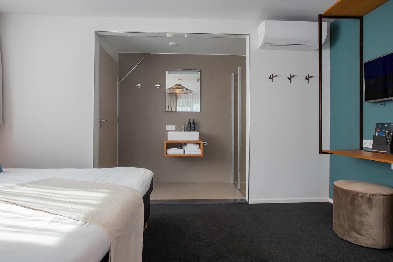 Boutique Hotel Texel De Cocksdorp  Eksteriør bilde A room at the hotel