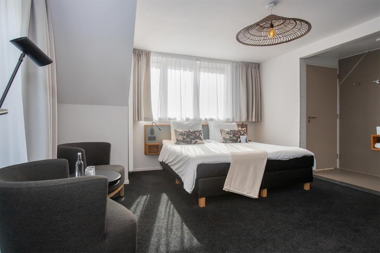 Boutique Hotel Texel De Cocksdorp  Eksteriør bilde A room at the hotel