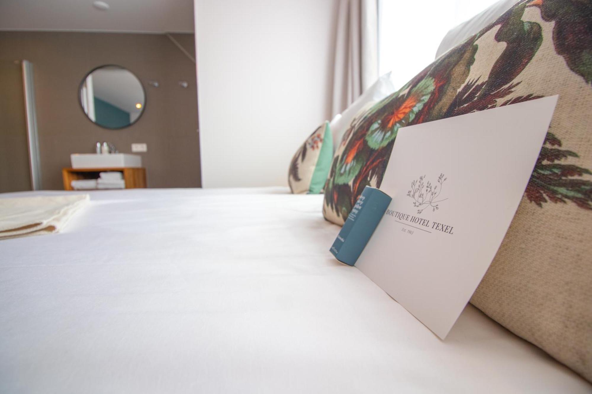Boutique Hotel Texel De Cocksdorp  Rom bilde A room at the hotel
