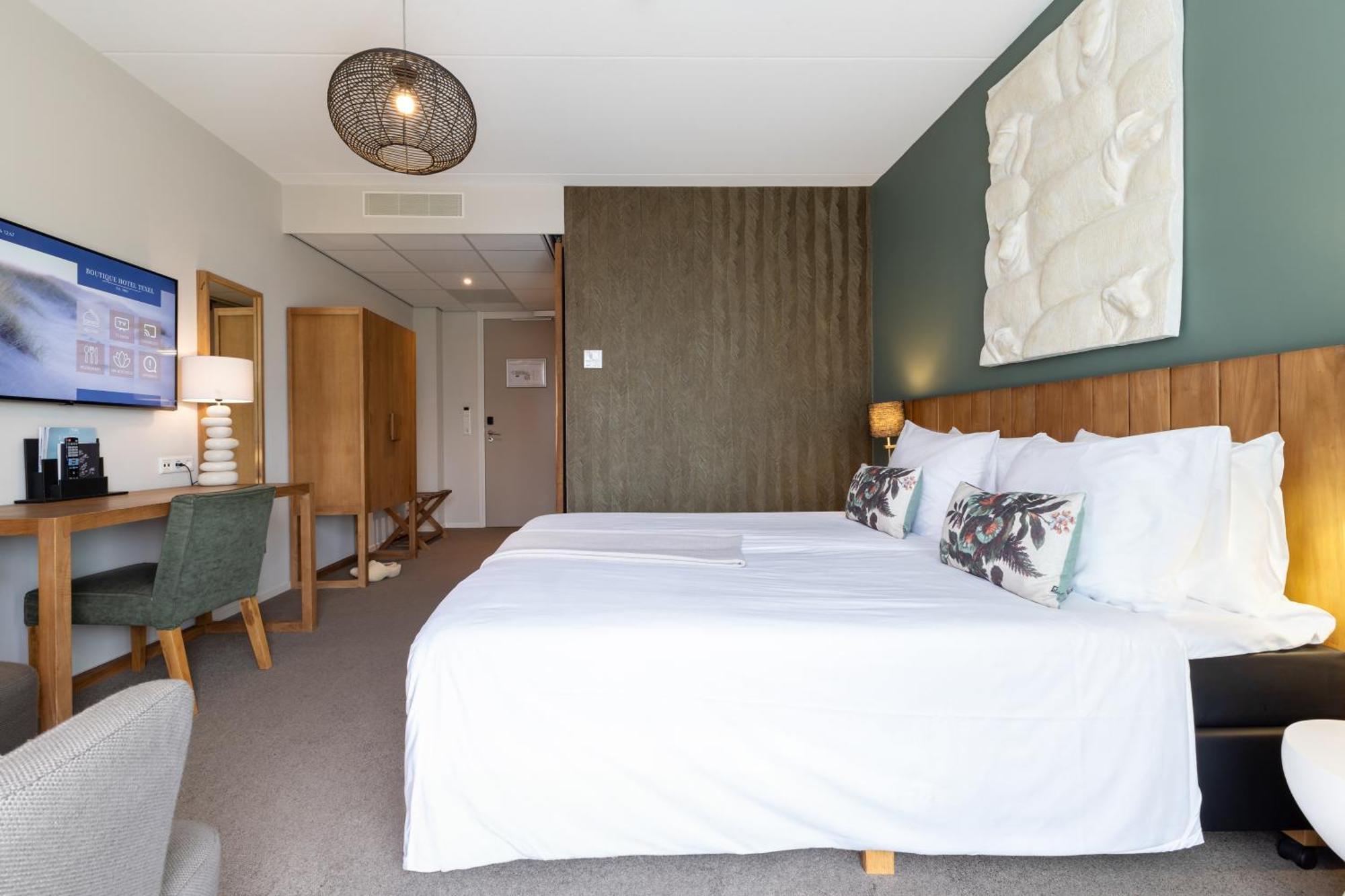 Boutique Hotel Texel De Cocksdorp  Eksteriør bilde A room at the hotel