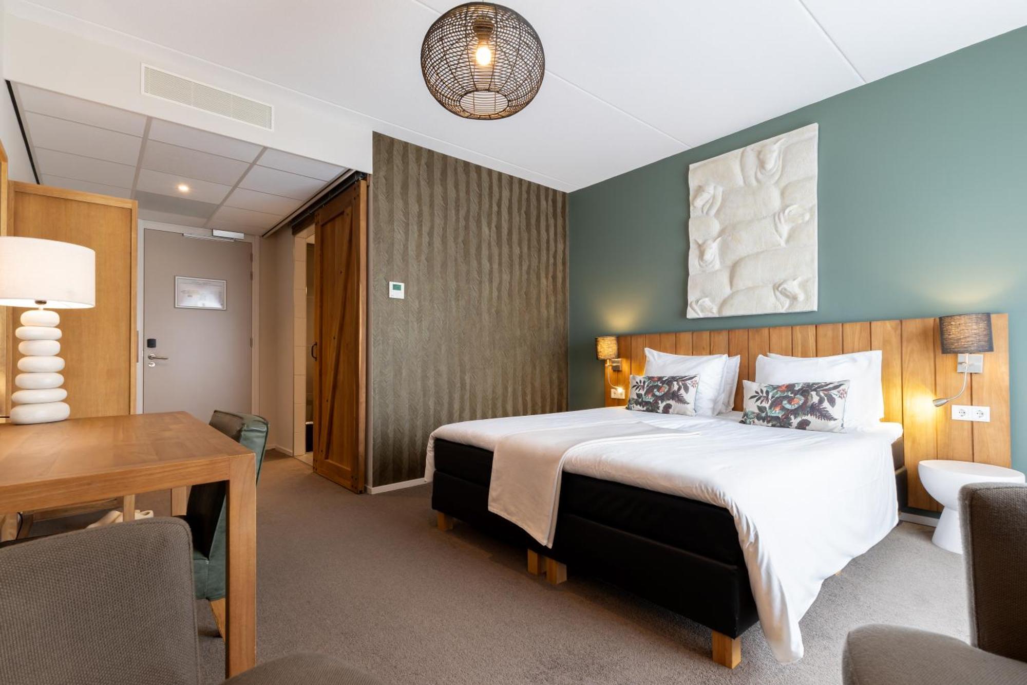 Boutique Hotel Texel De Cocksdorp  Eksteriør bilde A room at the hotel